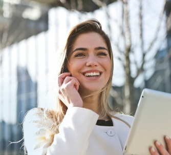 gallery/woman-in-white-blazer-holding-tablet-computer-789822